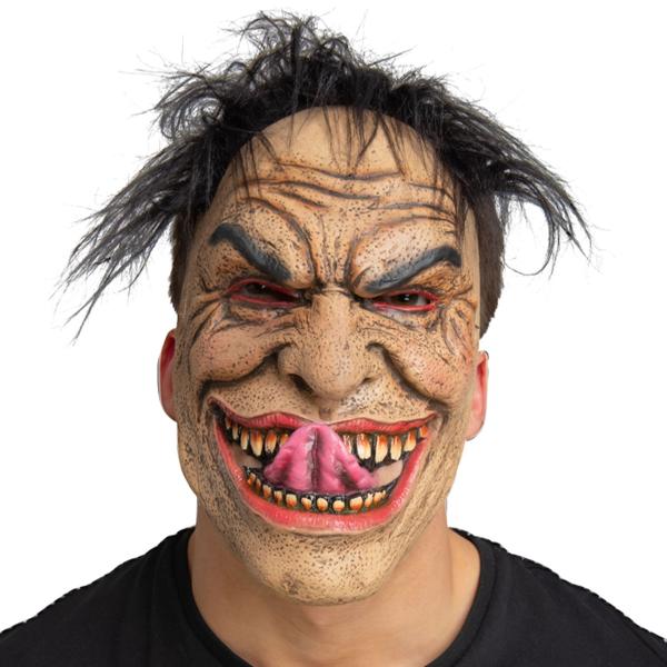 Lateksinaamio Hiuksilla ja Pelottavalla Hymyllä