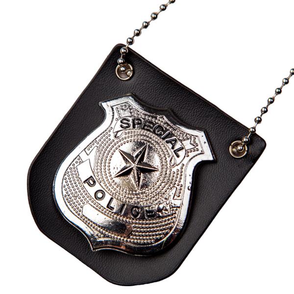 Poliisimerkki Kaulanauhassa